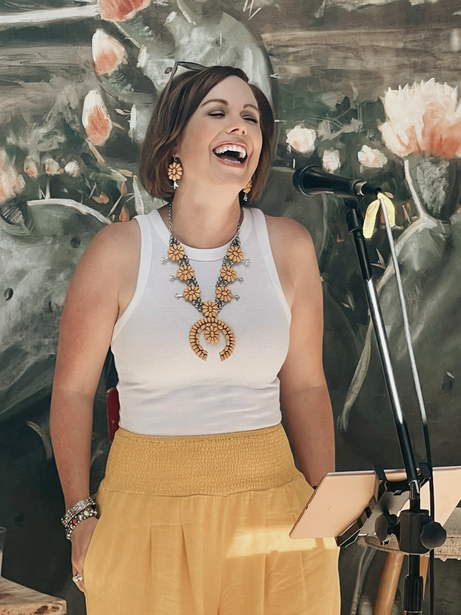 Amber Pennington singing at a live performance