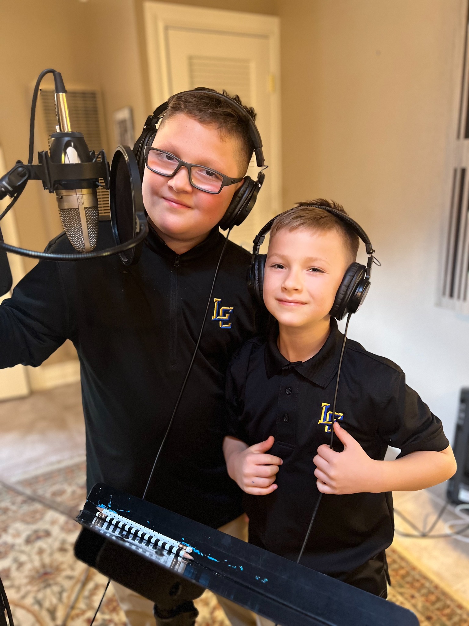 Two students recording together in the studio